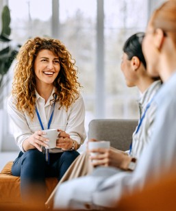  Smiling colleagues casually chatting