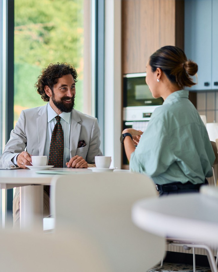 Business partners enjoying a coffee break