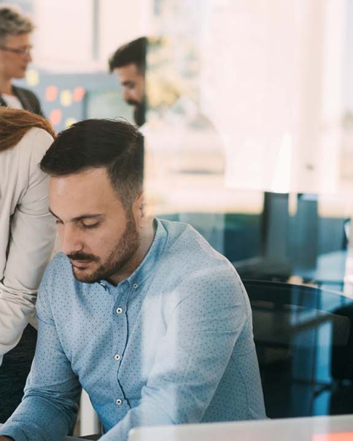 Colleagues work together in an office