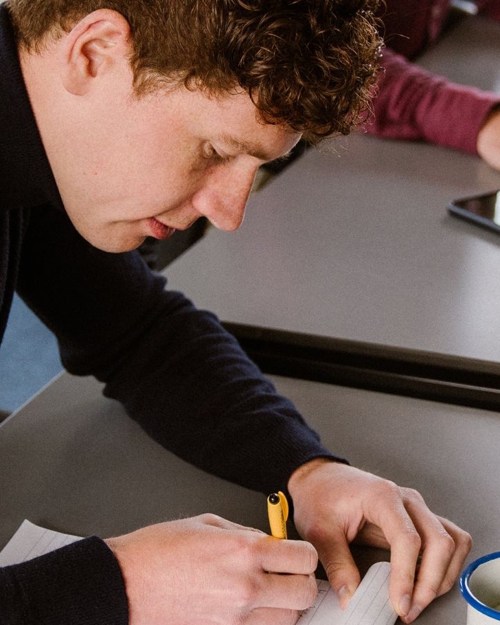 Sales rep working on their to-do list