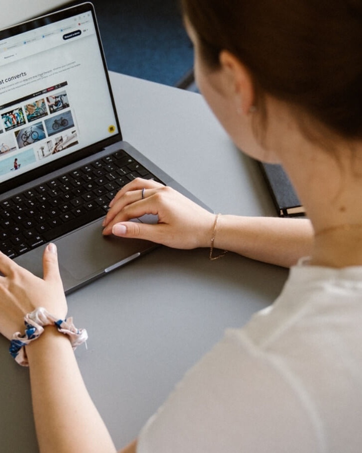 Woman working on her laptop at work