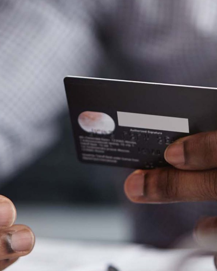 Man uses credit card for online purchase