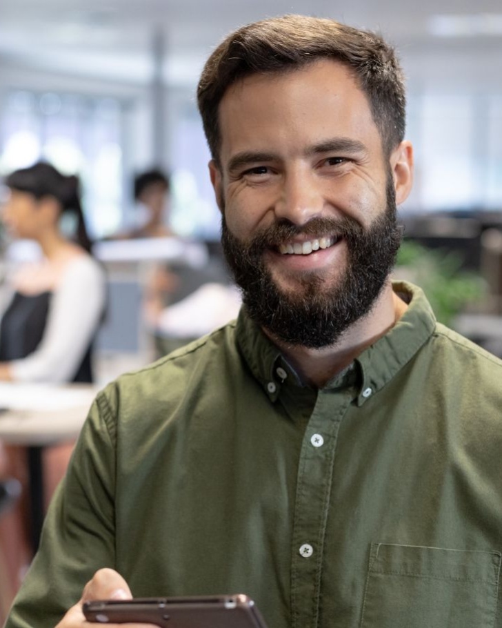 Man smiling at the office