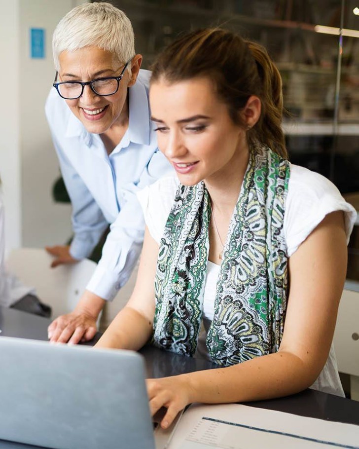 People working on a laptop