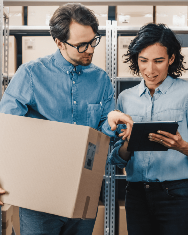 two people in a warehouse looking at a table what buyers want report image