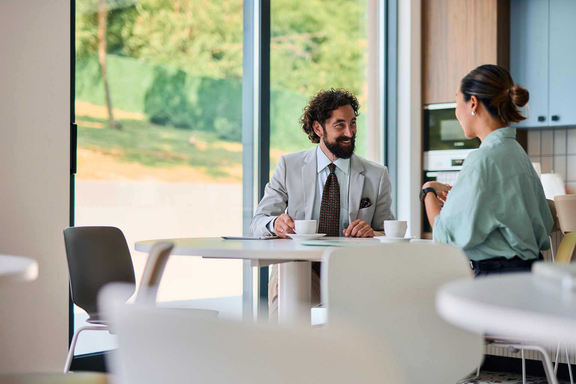 Business partners enjoying a coffee break
