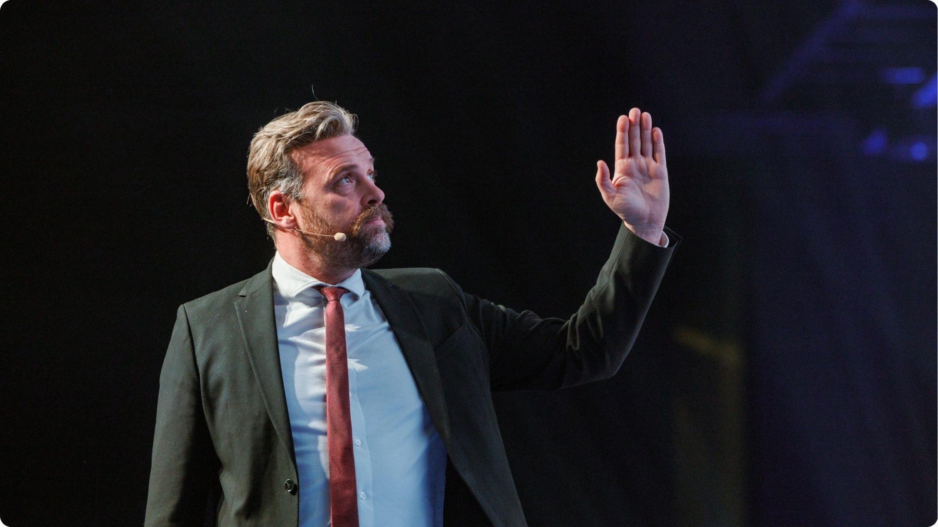 Profile of Prof Henrik von Scheel delivering a talk