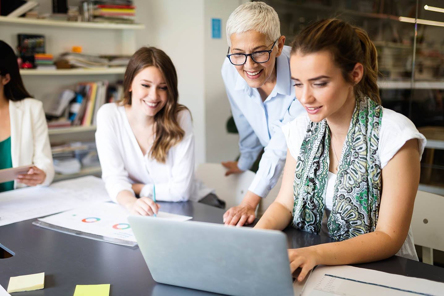 People working on a laptop