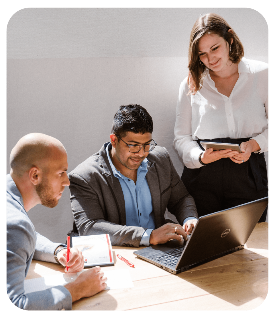 sana customer success team working around a laptop