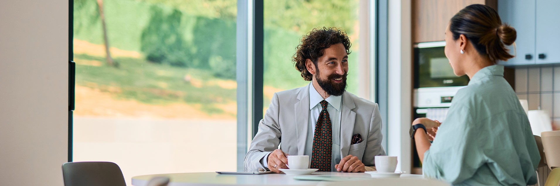 Business partners enjoying a coffee break