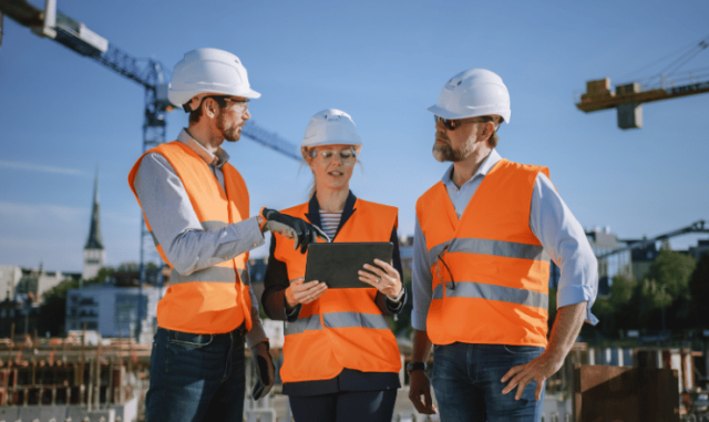 Construction worker discussing