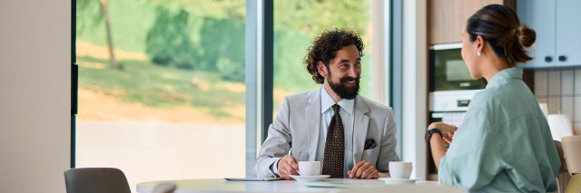 Business partners enjoying a coffee break