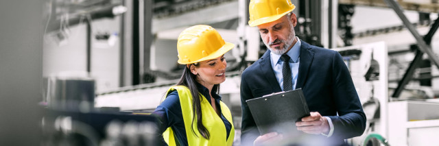 Manufacturing machinery team reading