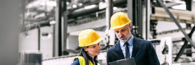 Manufacturing machinery team reading