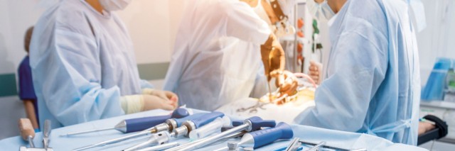 Doctors at surgery using tools available to them