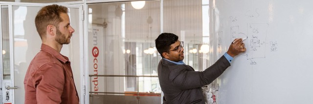 Man writing on a whiteboard
