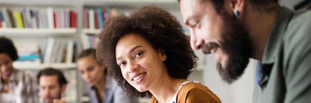 Man and woman discussing ecommerce and edi project