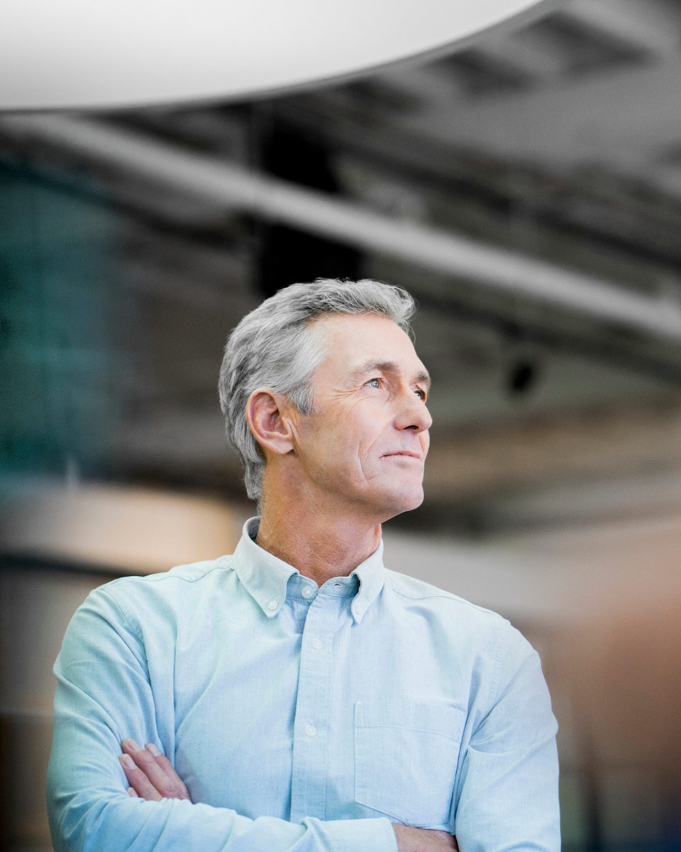Businessman looking away at office
