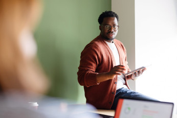 Team discussing happily
