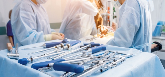 Doctors at surgery using tools available to them