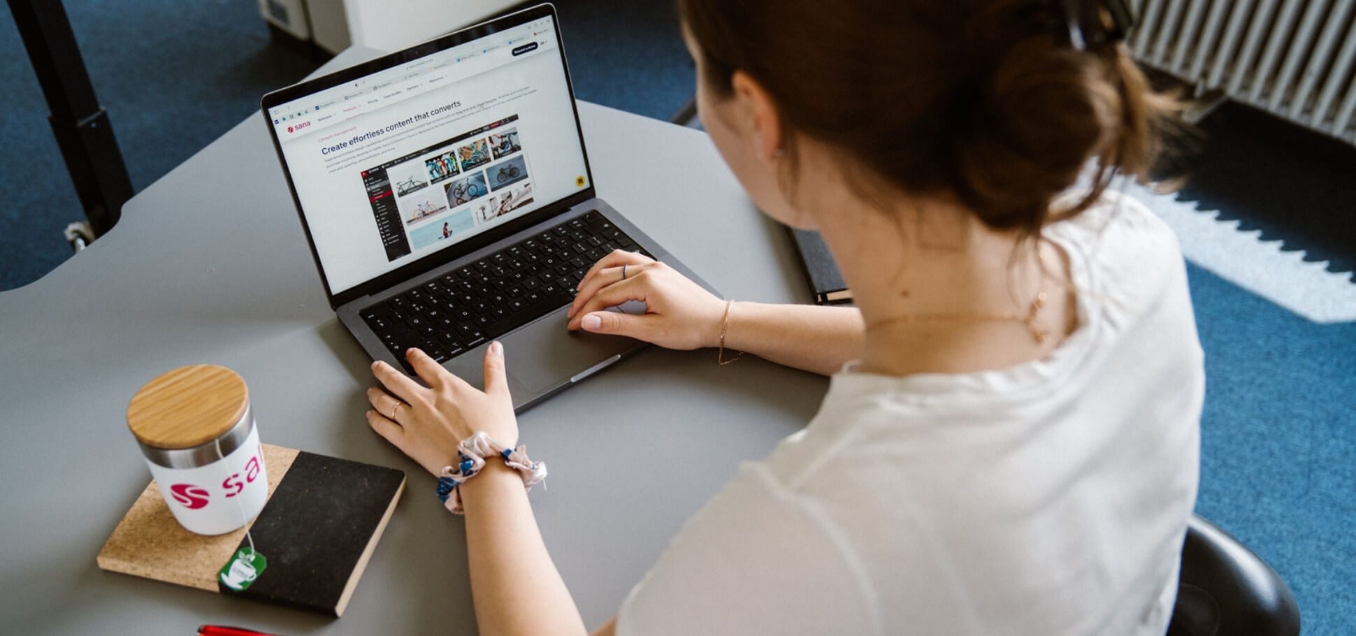 Woman working on her laptop at work