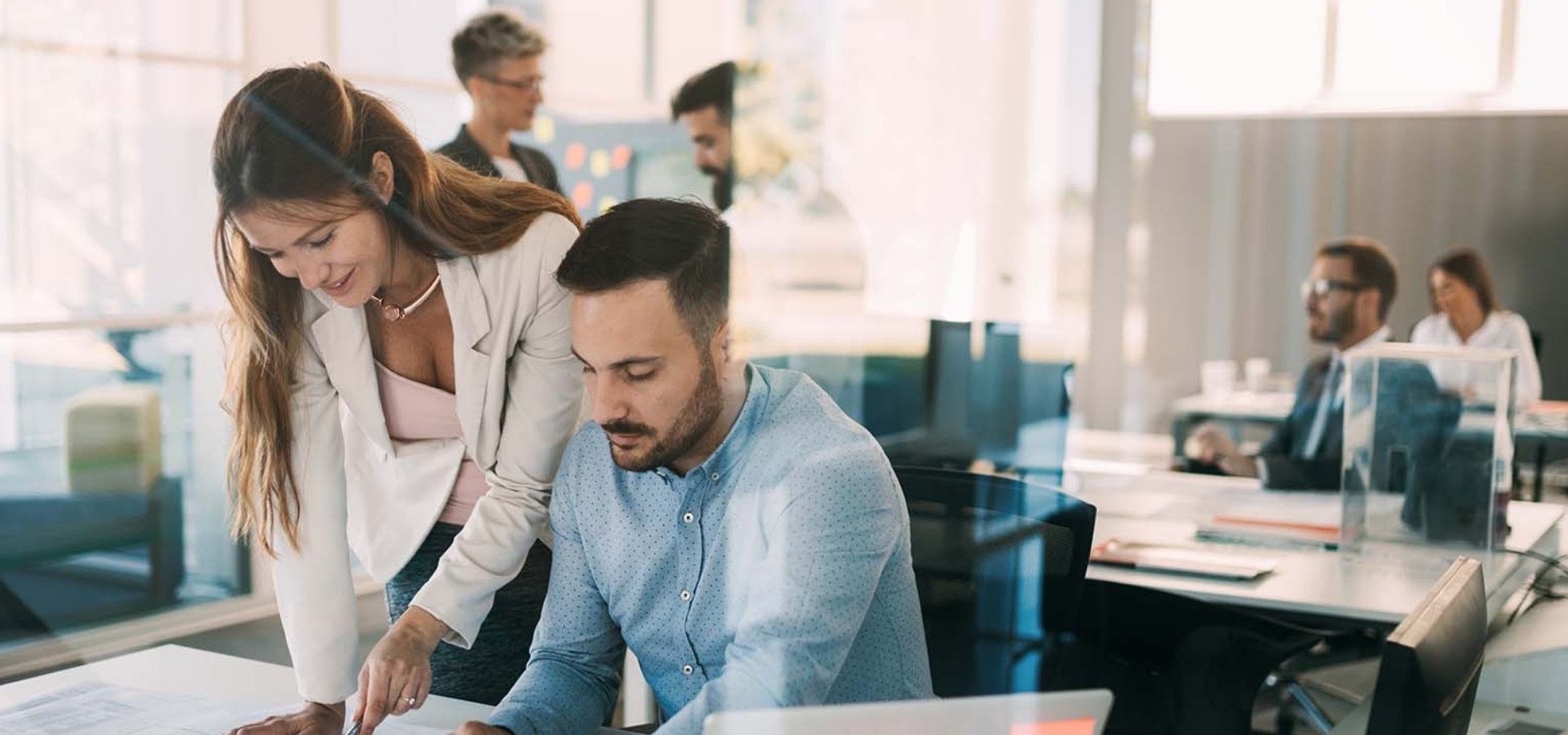 Colleagues work together in an office