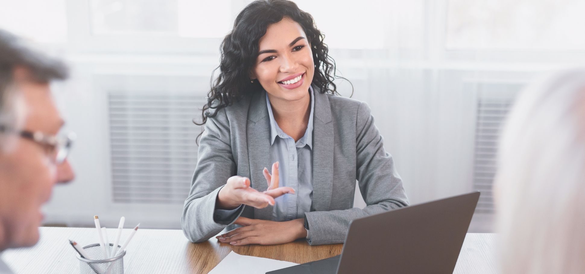 Woman presenting from her laptop