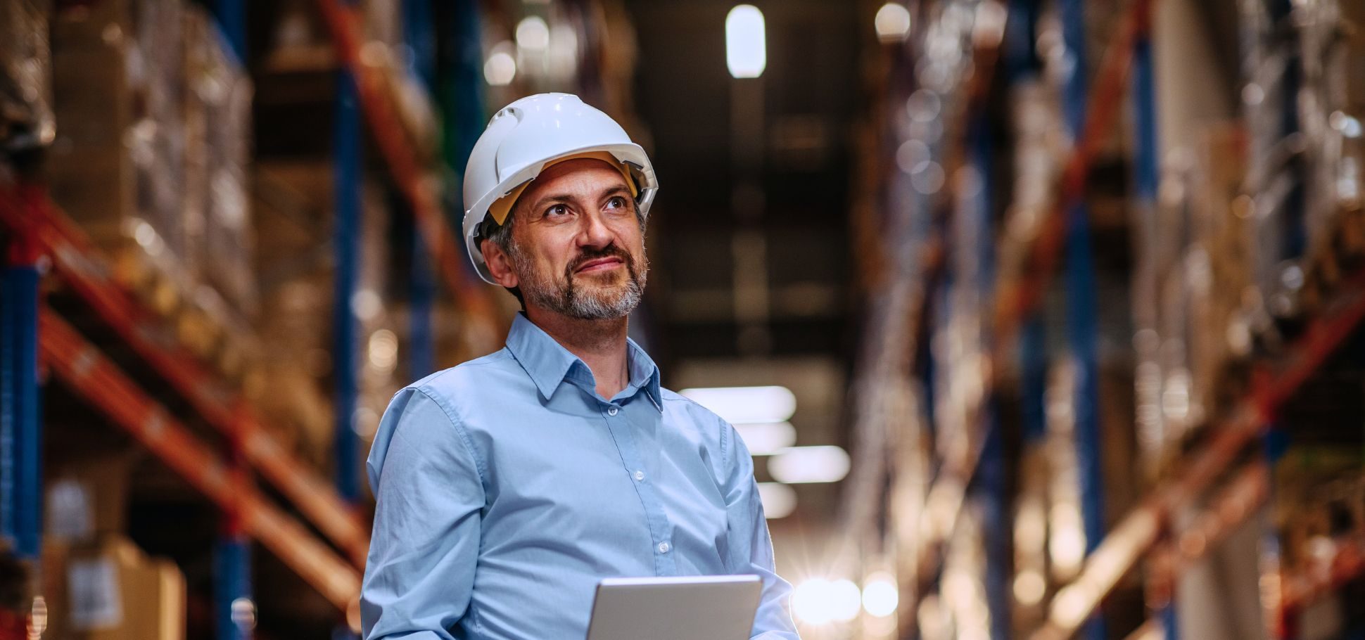 Man with digital tablet in factory