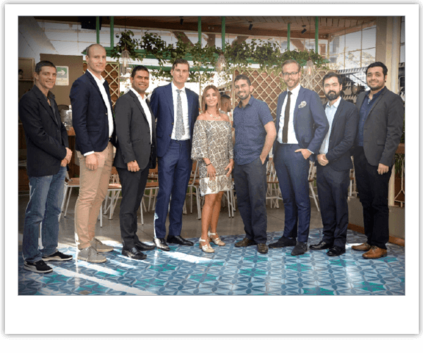 The Sana team in Medellín poses for a group shot amid the festivities.